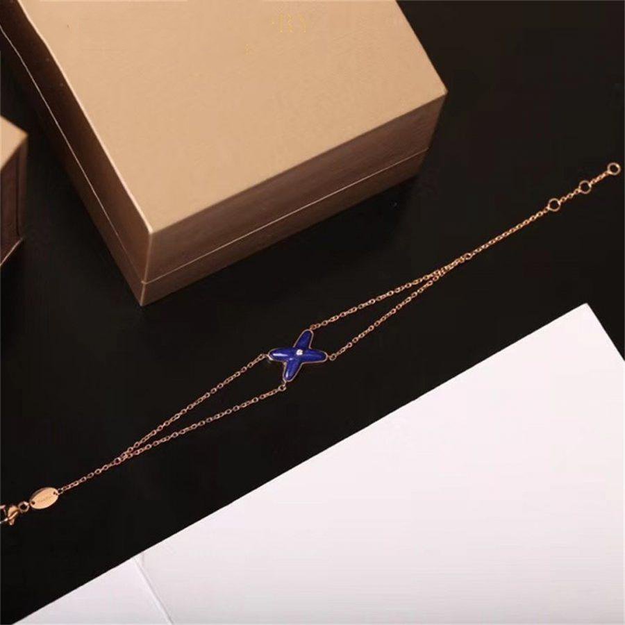 ¡®Loco¡¯Hollow Design Four-Leaf Clover Flower Shape Ring